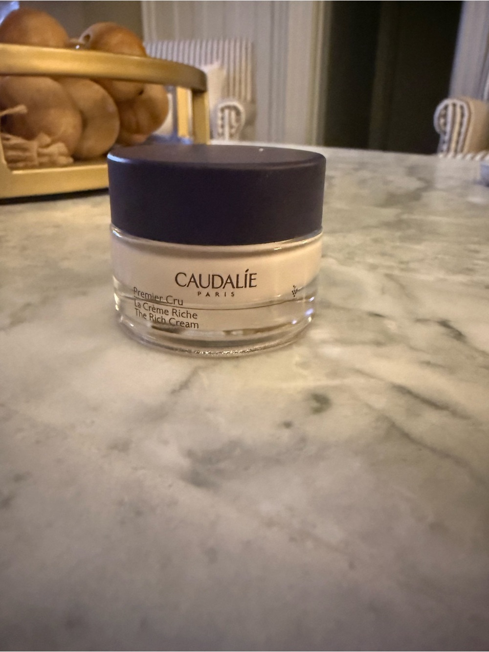 Caudalie White Jar with Dark Purple Cap Moisturizer